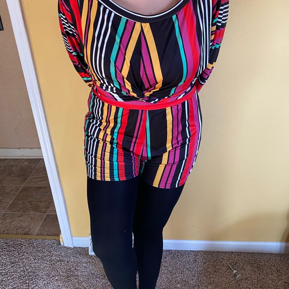 NEW Two piece long sleeve shirt and shorts set.